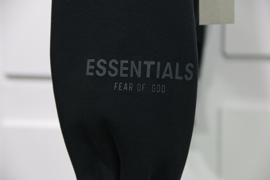 fear of god essentials pullover hoodie applique logo