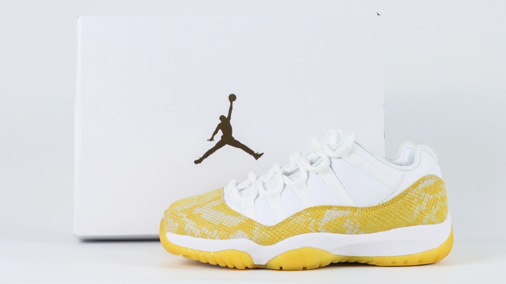 jordan 11 retro low yellow snakeskin (women’s)